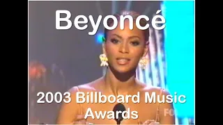 Beyoncé at the 2003 Billboard Music Awards (winning 4 awards) -- DMC and Tommy Lee present