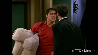 Chandler and Joey fight for the couch