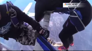 Caught on cam: Skydivers survive fiery mid-air plane crash