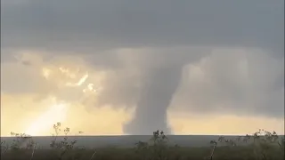 Hail-Wrapped Tornado Passes Directly In-Front Of Sun, And Lifts Under An Orange Sky (June 12th 2023)