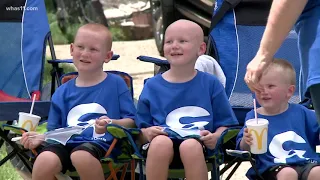 Louisville first grader receives welcome home parade after recovering from brain cancer