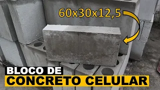 Bloco de concreto celular medindo 60x30x12,5 cm.