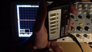 Chinese anal-probe waveform analysis on an oscilloscope.