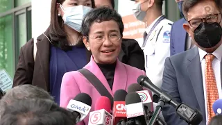 Rappler CEO Maria Ressa faces the media after acquittal in tax cases