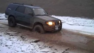 Toyota 4Runner gets stuck in some ice/mud