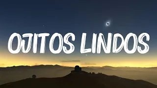 Bad Bunny - Ojitos Lindos (La Letra / Lyrics) ft. Bomba Estéreo