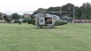 AH-64 army attack helicopter and Lynx taking off