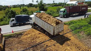 Wonderful Land filling Dump Trucks SHACMAN With SHANTUI DH17c2 Dozer Push to clean the soil