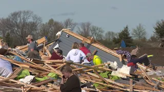 Residents begin going through the rubble after tornadoes hammer parts of Nebraska and Iowa