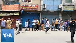 Crowds Form Outside Liquor Stores as India Eases Coronavirus Lockdown