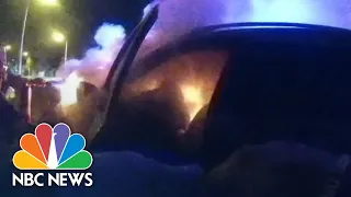 Police Bodycam Video Shows Driver Pulled From Burning Vehicle