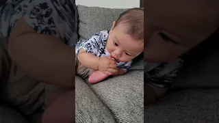 Baby Theo looking to snack on his little toes