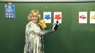 Using puppets and flashcards to get children talking in English