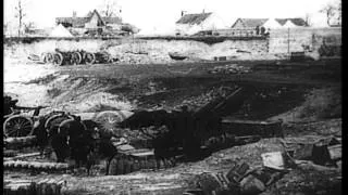 British artillerymen fire a 9.2 inch howitzer in France, during World War I HD Stock Footage