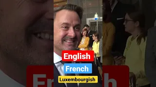 English - French - Luxembourgish. Xavier Bettel always a HAPPY leader!