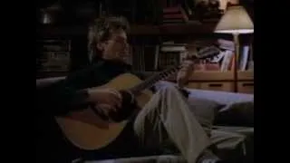 MacGyver playing guitar