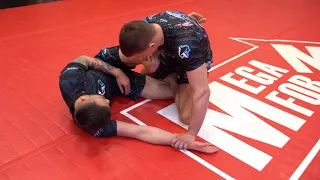 Marcin Held:  Straight foot lock from half guard