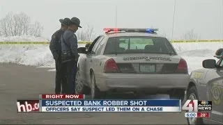 Robber wounded, leads police on chase