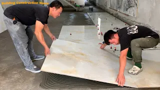 Professional Living Room Floor Construction Worker Using Large Size Ceramic Tiles 120 x120cm