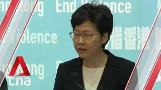 Hong Kong leader Carrie Lam invokes law to ban face masks in protests