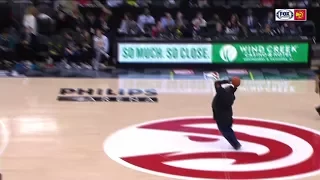 Hawks fan drills half-court shot for $10,000 | ESPN