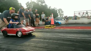 POWER WHEELS CHAMP Stingray Corvette vs Ford mustang running at Sand Mountain Dragway