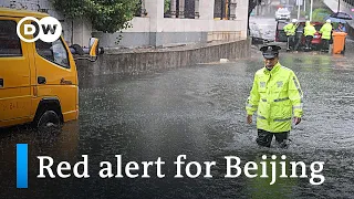 Typhoon Doksuri wreaks havoc in Beijing and northern China | DW News