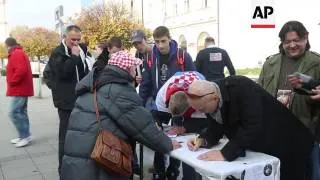 Nationalists prevent liberal govt officials from joining march marking anniversary of fall of Vukova