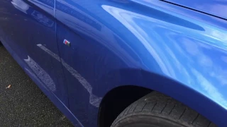 BMW wing damage