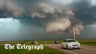 Extraordinary footage shows funnel cloud forming over Oklahoma amid tornado warning