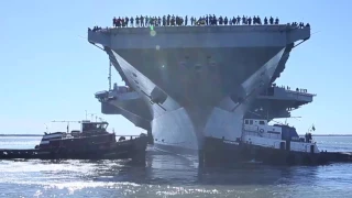 USS Gerald R. Ford (CVN 78) departs the shipyard.