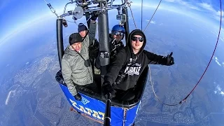 Parachute jump out of hot air baloon.