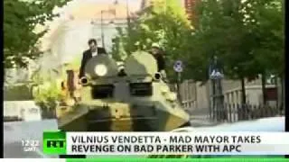 Mayor crushes illegally parked car with tank