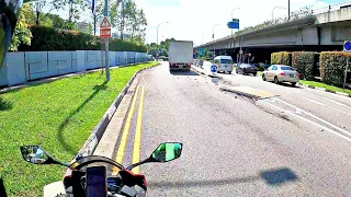 lorry mounts curb, door breaks off