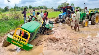 John Deere 5045D tractor stuck in mud ||takes help new holland and John Deere tractors||