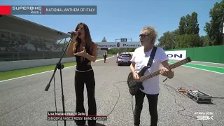 Lisa Manara, accompagnata dal "Gallo" Golinelli, canta l'Inno d'Italia al circuito di Imola. 07/2023