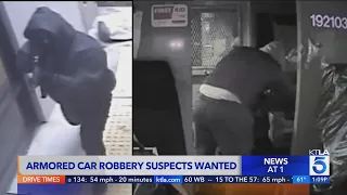 Armored car robbery suspects wanted by FBI