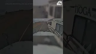 Shocking video shows motor home overturn after veering into semi-truck