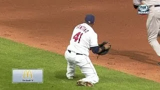 Santana snags grounder on a diving stop