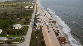 Beach restoration project in St. Johns County, nearly a quarter complete