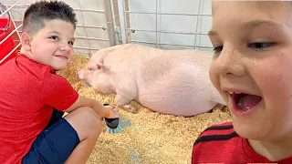 BEST PETTING ZOO! Caleb Learns to to Feed and Take Care of Farm Animals with Mom & Dad
