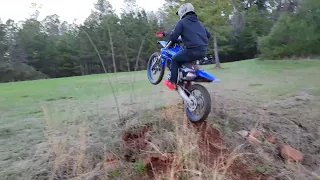 kid jumping his yz250f. We made a good ramp, let's test it out.