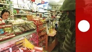 Video: Masked soldiers in Crimea queue up for sausages at grocery store