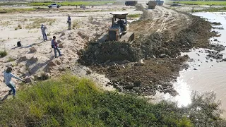 Most Ingenious Bulldozer Push Soil with Dump Truck Unloading Soil Filling Land in Operation process