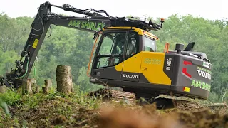 Volvo EC140E Using Steelwrist to Form Drainage Ditch