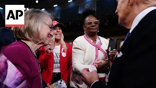 Marjorie Taylor Greene gives Biden a Laken Riley pin