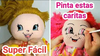 Pintando caritas de muñecas en tela