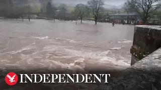 Storm Franklin: Village green plunged underwater after river bursts banks