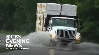 Tornadoes and flash floods hit Midwest, South