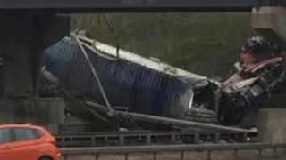 A12 crash: Lorry plunges from bridge onto major road in Essex